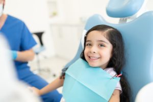 Happy young girl at appointment for laser dentistry in Scottsdale