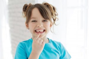 girl with missing tooth 