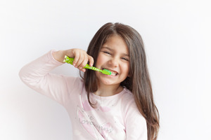 child brushing their teeth